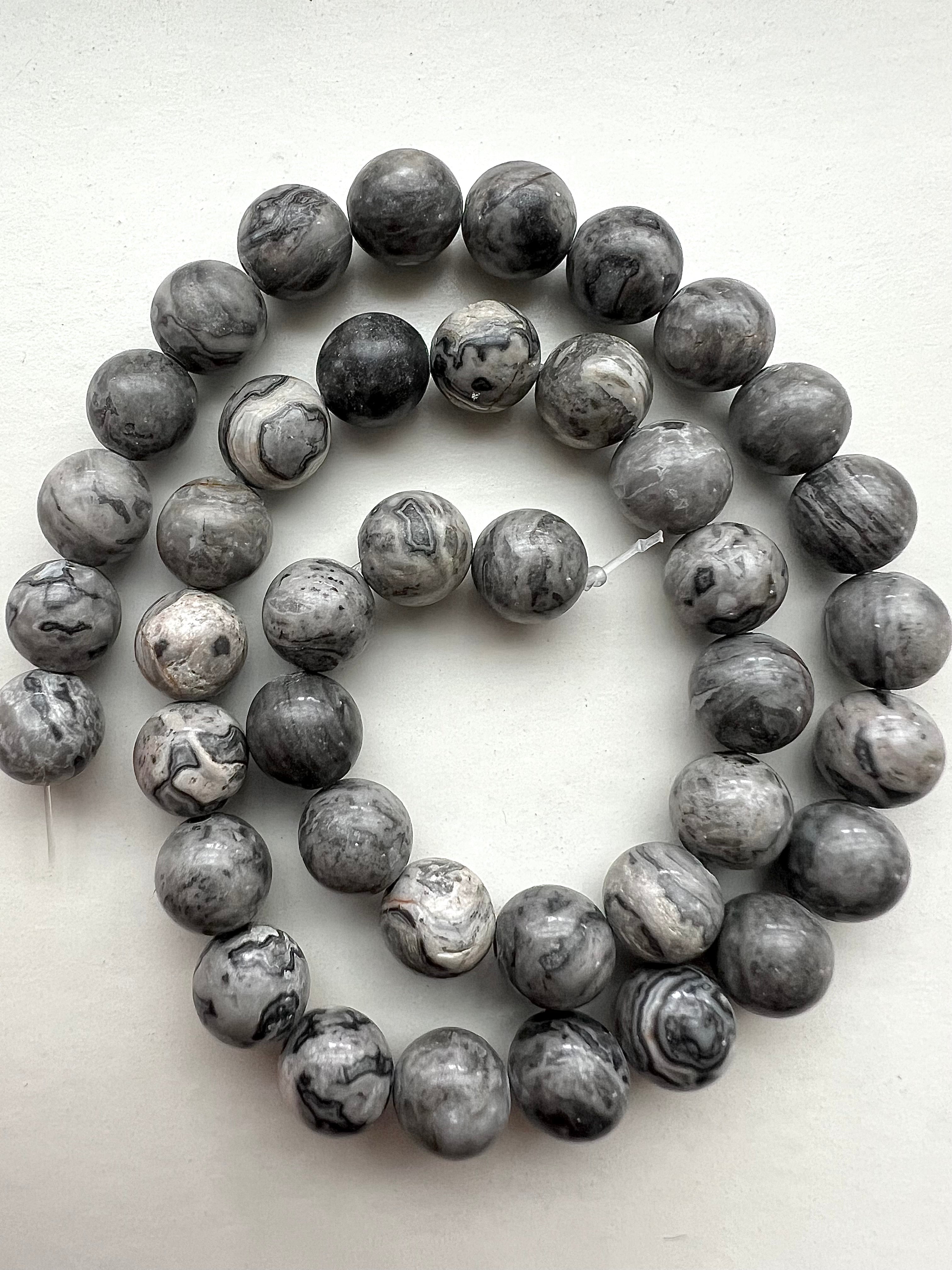 Marmorerad Jaspis, Pärlor – Jordande & Eleganta Smycken för Balans och Skydd