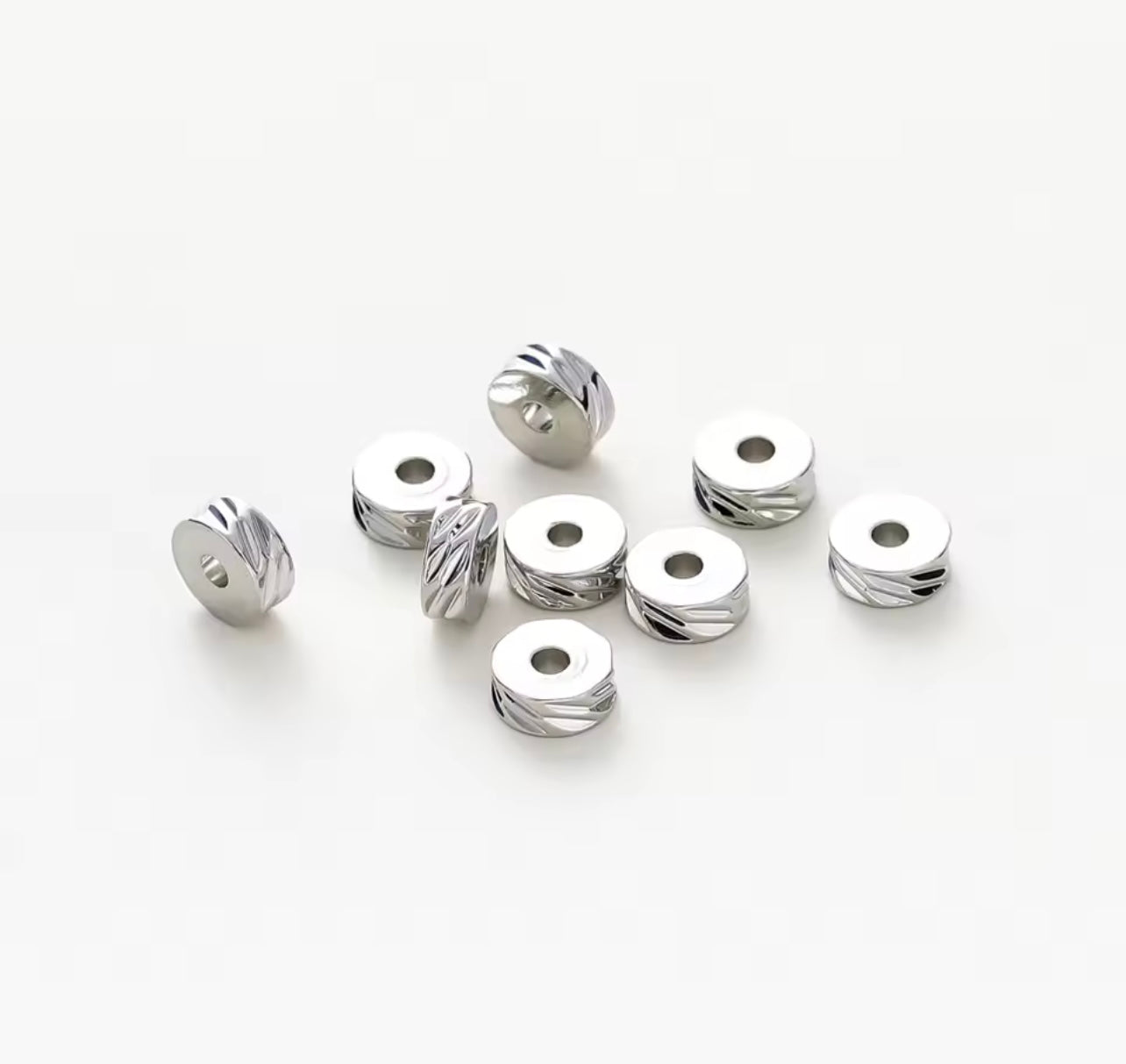Mellanledspärlor i Stål 6 mm, 50 st – Tåliga och stilrena detaljer för smyckestillverkning